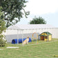 Outdoor dog kennel with silver chain-link walls and sloped roof in a backyard yard setting