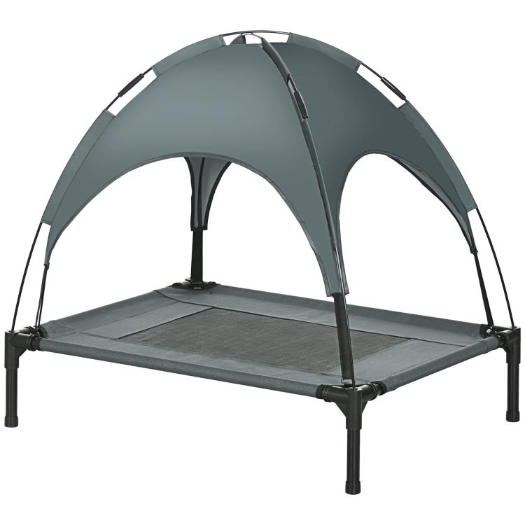 Gray outdoor pet cot with arched removable canopy and mesh sleeping surface