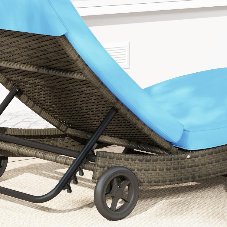 Outdoor wicker chaise lounge with sky blue cushion and two wheels, adjustable backrest