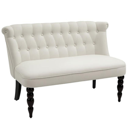 Cream fabric armless loveseat with button-tufted backrest and dark wood legs