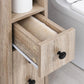 Oak bathroom cabinet drawer with black knob and open storage compartment