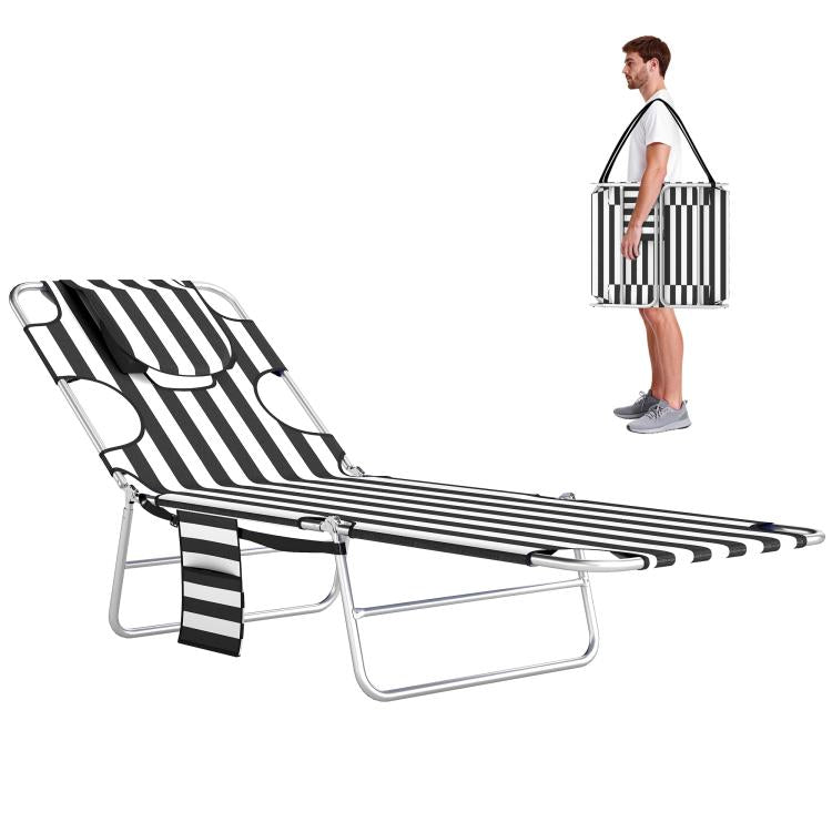 Black-and-white striped tanning chaise lounge chair with face hole and detachable head pillow