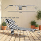 Striped tanning chaise lounge chair with face hole, head pillow, and folding steel frame