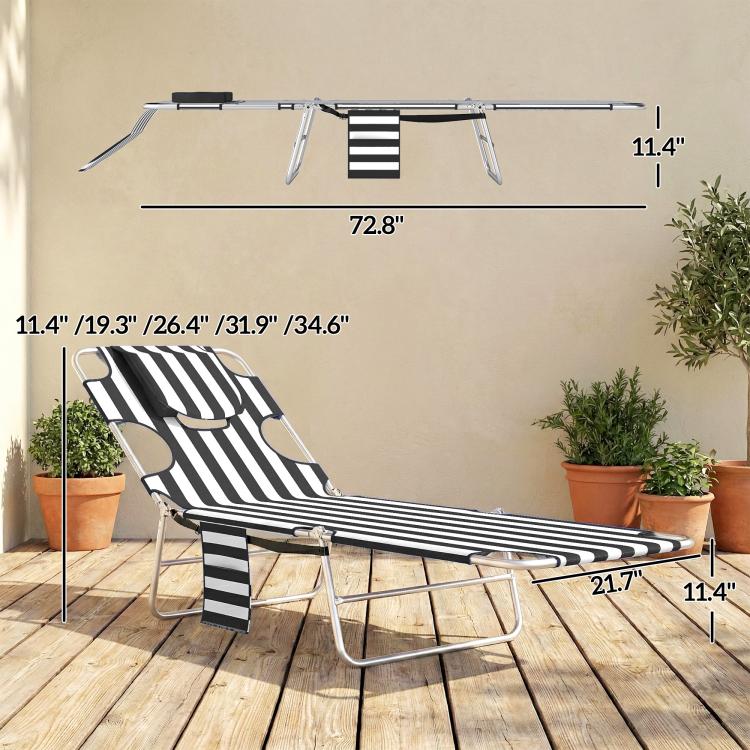 Striped tanning chaise lounge chair with face hole, head pillow, and folding steel frame