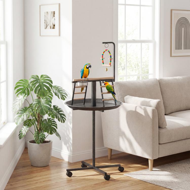 Bird play stand with round base tray, wood perch, and ladders on rolling wheels