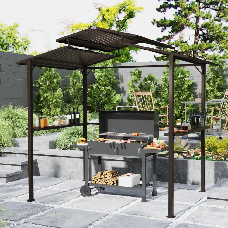 Hardtop grill gazebo over an outdoor grill with side shelves on a patio.