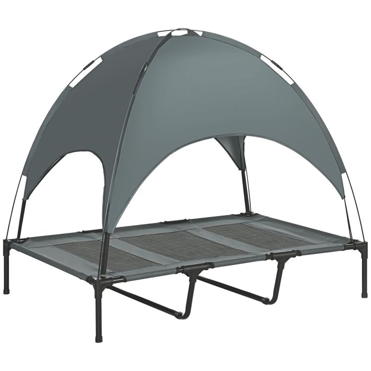 Elevated dog cot with dark gray UV canopy shade and mesh platform