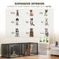 Large expandable dog crate interior with divider, dark steel bars in living-room setting