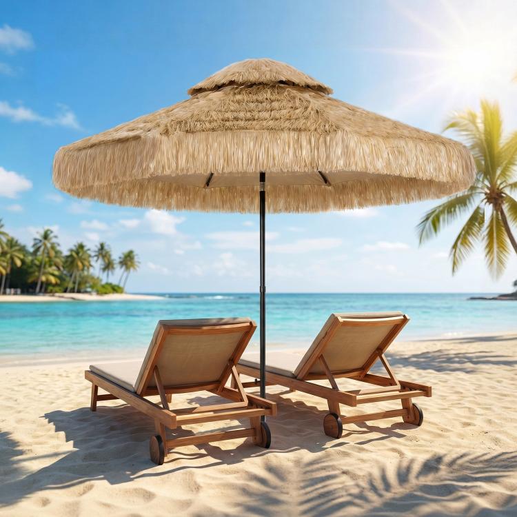 Khaki thatched patio umbrella with straw fringe and black center pole, open over patio