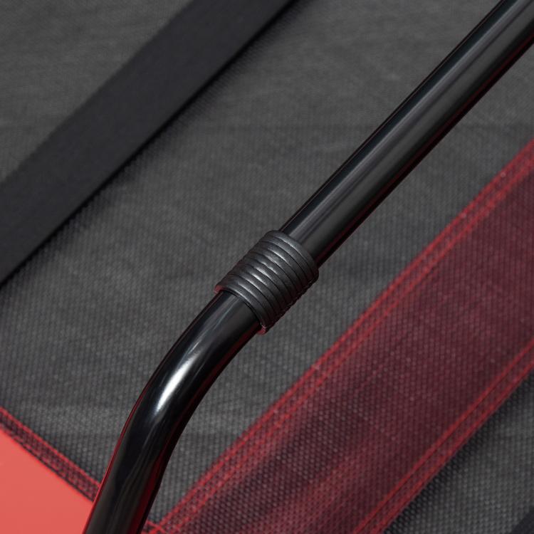 Close-up of black steel frame corner on a red elevated pet bed cot