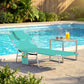 Light green outdoor chaise lounge with face hole and padded head pillow on metal legs