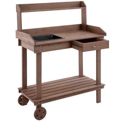 Brown wooden potting bench with open shelf, drawer, and removable sink insert