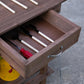 Brown wooden potting bench work table drawer open with gardening tools