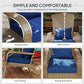 Rattan wicker Adirondack chair with dark blue cushions, wide armrests and high back