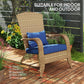 Rattan wicker Adirondack chair with dark blue cushions for indoor or outdoor use