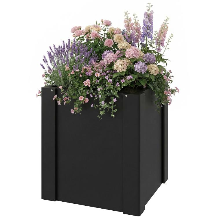 Black raised garden bed planter box filled with blooming flowers and green foliage