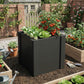 Black raised garden planter box with open top, soil bed, and gardening gloves nearby