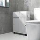 White toilet paper cabinet with top drawer, paneled doors, towel holder, on caster wheels.