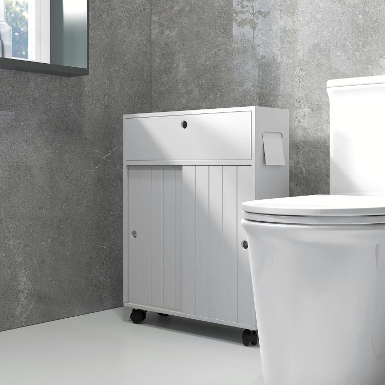 White toilet paper cabinet with top drawer, paneled doors, towel holder, on caster wheels.
