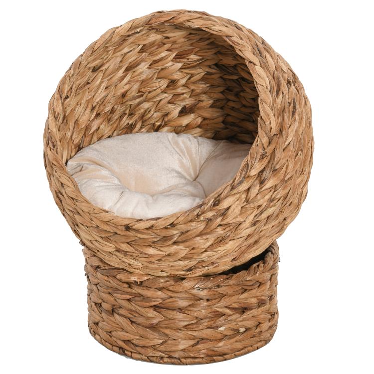Raised round wicker cat bed with egg-chair shape and light cushion insert