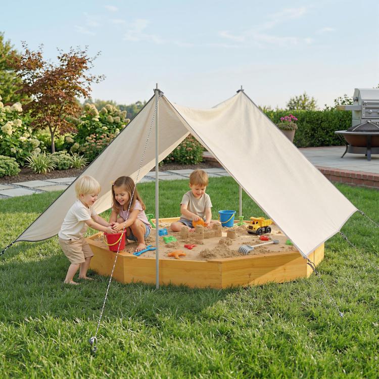 Yellow octagon wooden sandbox with beige canopy and four built-in bench seats.