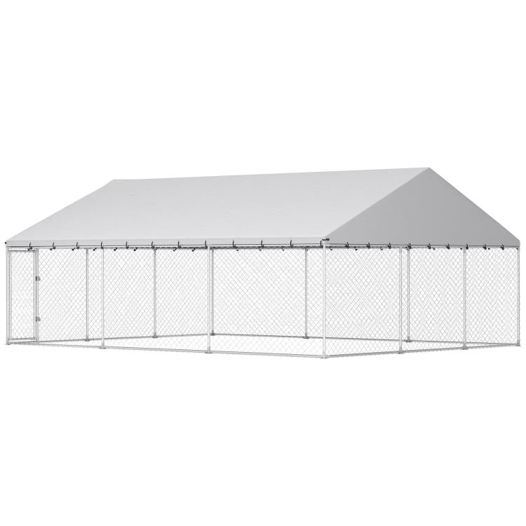 Outdoor dog kennel with gray roof cover and chain-link walls, front view