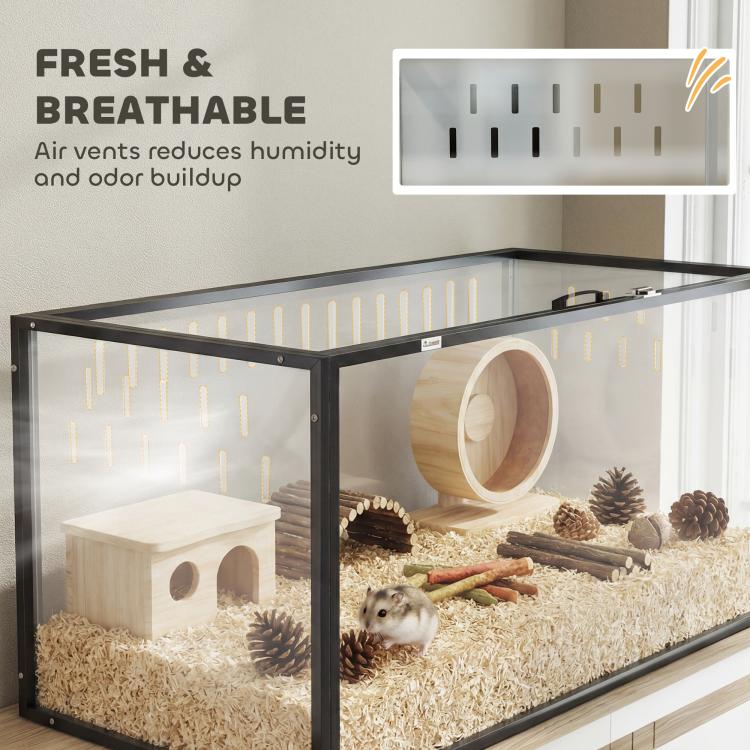 Acrylic hamster cage with black frame and front air-vent panel above bedding
