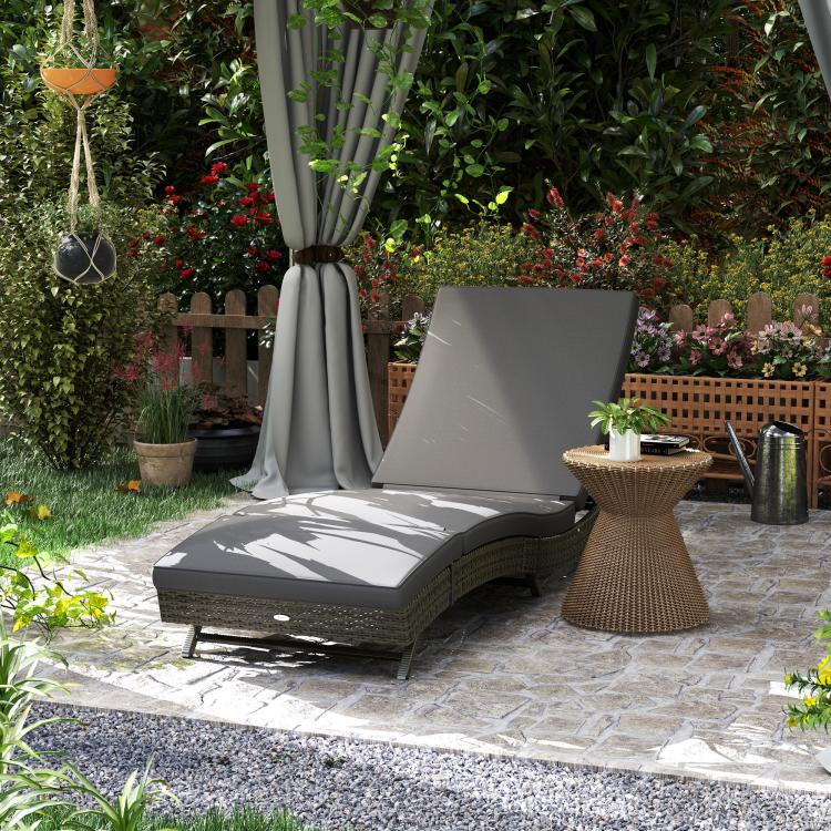 Gray PE rattan chaise lounge chair with adjustable backrest and padded cushions