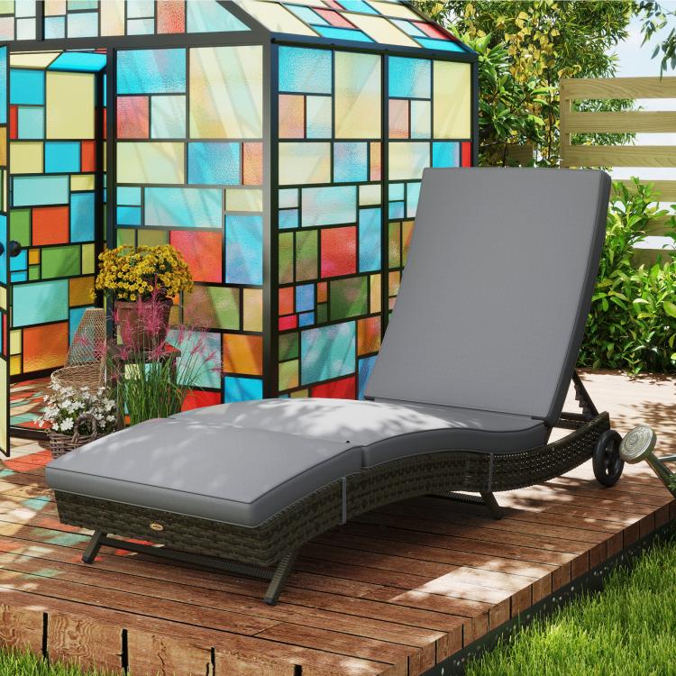 Gray outdoor chaise lounge chair with padded seat, adjustable backrest, and wheels