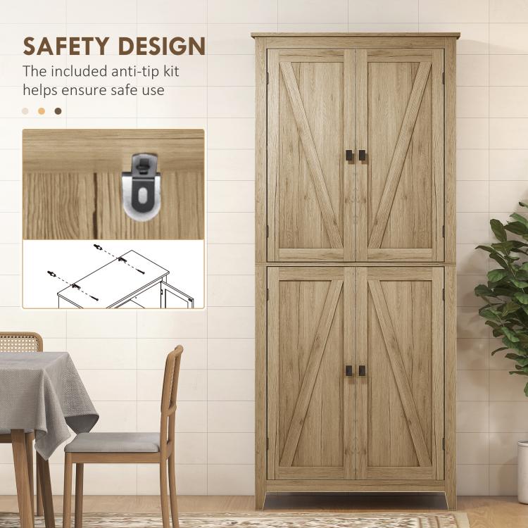Natural wood pantry cabinet with double barn doors and black handles