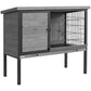Raised wooden rabbit hutch with open side panel and wire cage interior