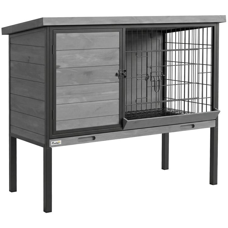 Raised wooden rabbit hutch with open side panel and wire cage interior