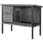 Outdoor wooden rabbit cage with open front, metal door bars, and pull-out tray