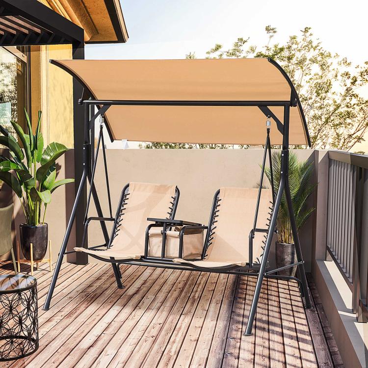 Two-person porch swing with beige sling seats under curved canopy, black steel frame