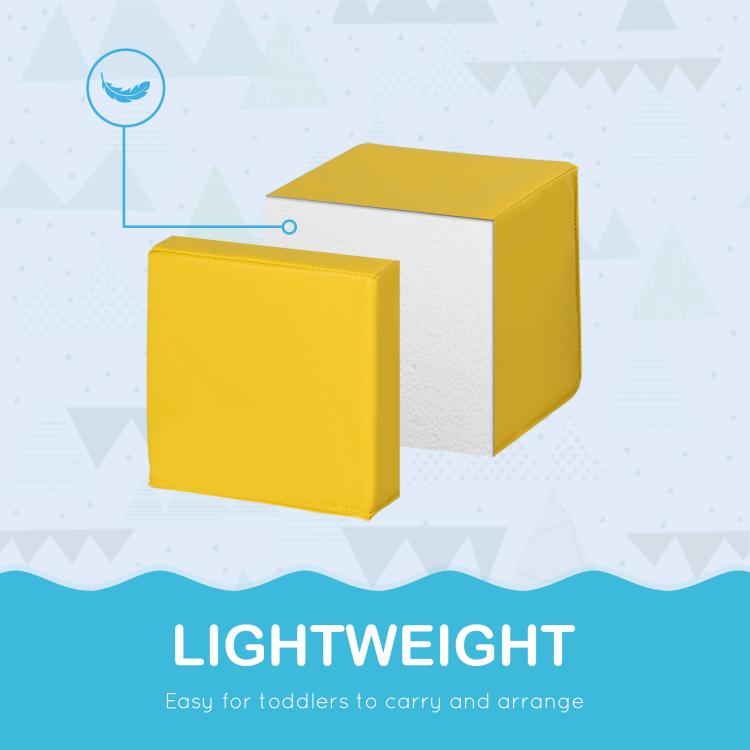 Yellow and white foam cube blocks shown close-up, soft building blocks for toddlers