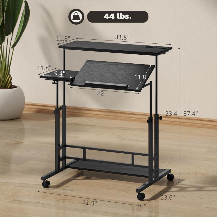 Black standing desk with tilting tabletop and keyboard tray on caster wheels, lower shelf.