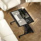 Black tilting tabletop desk with laptop and keyboard tray plus built-in power outlet panel.