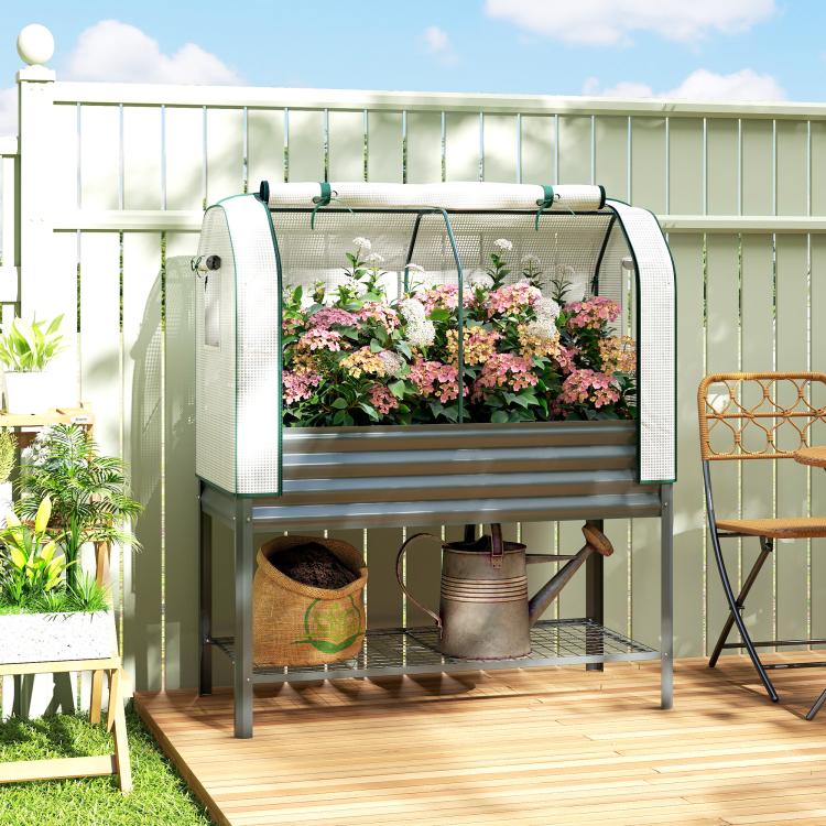 Dark gray raised garden bed with clear greenhouse cover, open side mesh door, and bottom shelf