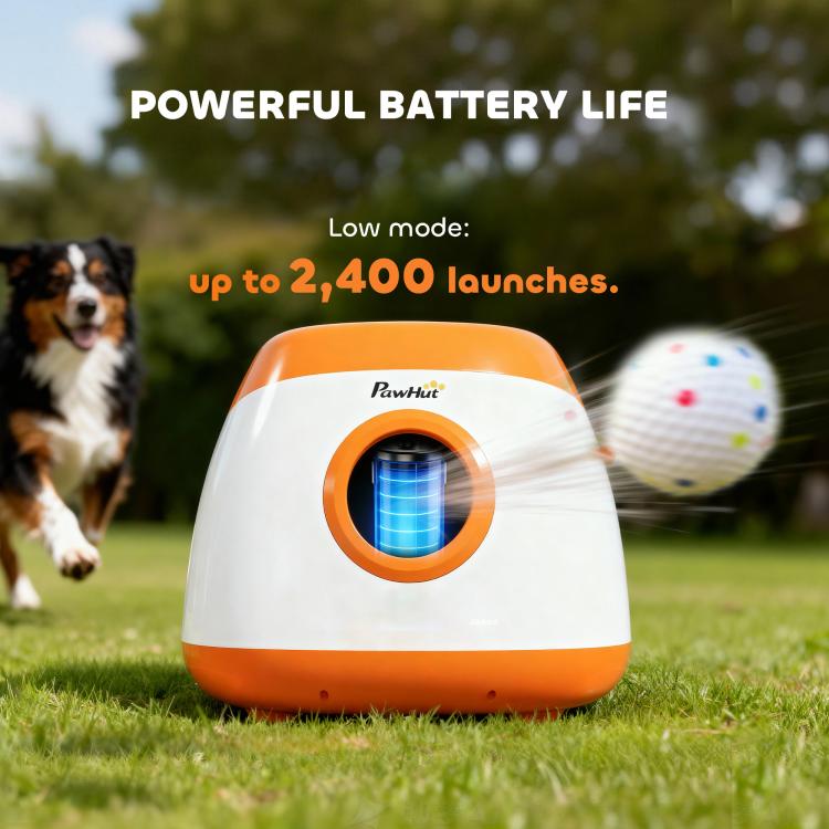 Automatic dog ball launcher in orange and white with speckled ball and dog on grass