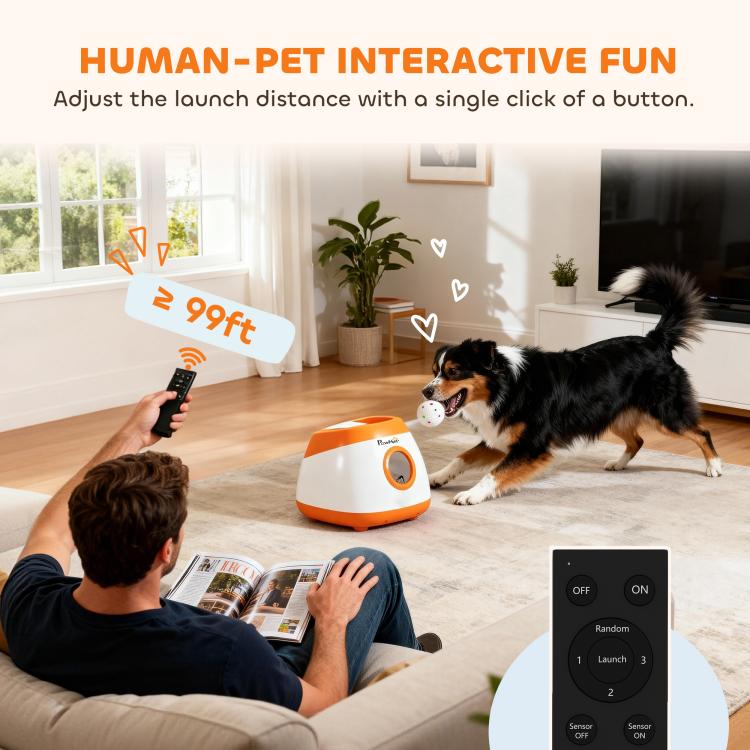 Automatic dog ball launcher indoors with remote control and speckled ball near two dogs