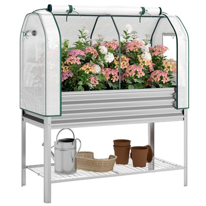 Silver raised garden bed with green mesh greenhouse cover and two-tier shelf