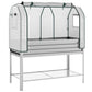 Raised garden bed with silver frame and clear greenhouse cover with green clips