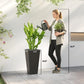 Tall black plastic planter set of 2 with dimensions shown, held near potted plants