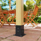 Black pergola post base plate with mounting holes on patio with light wood post