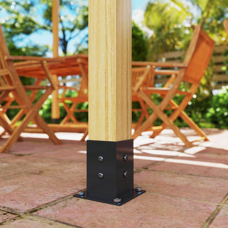 Black pergola post base plate with mounting holes on patio with light wood post