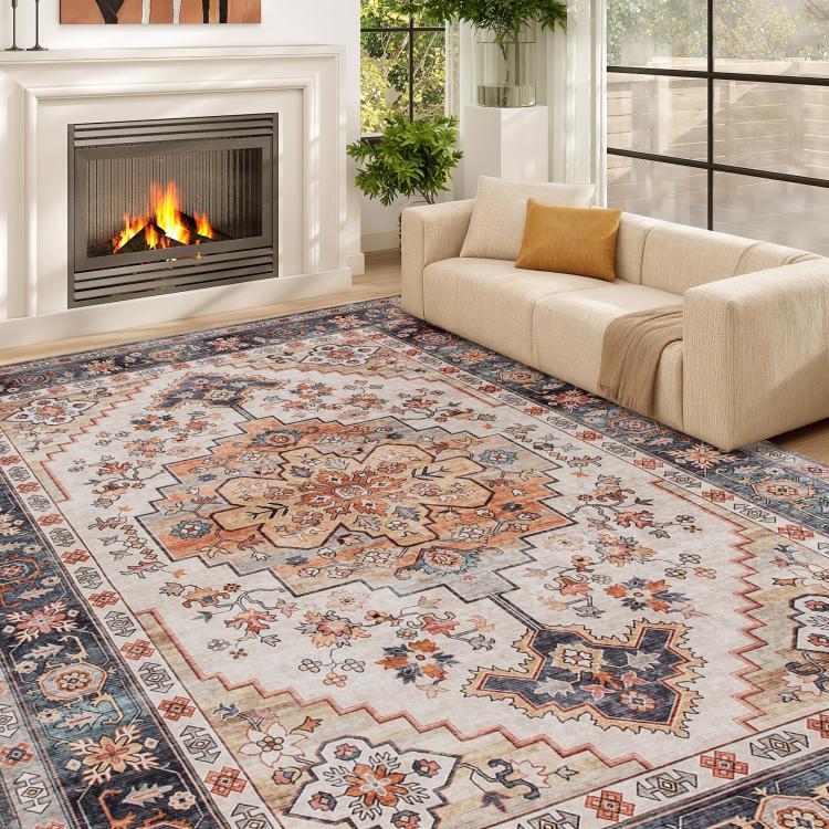 Tawny brown boho medallion area rug with multicolor floral and geometric border