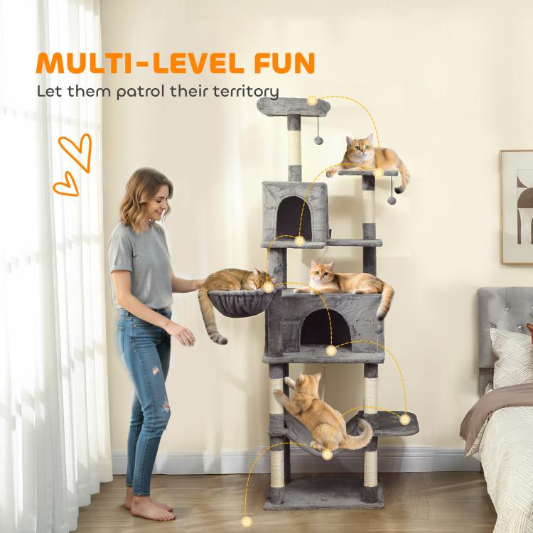 Dark gray cat tower with two hanging balls, condos, hammocks, and stacked perches
