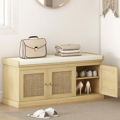 Light oak shoe storage bench with cushion, woven rattan cabinet doors, open shoe shelves