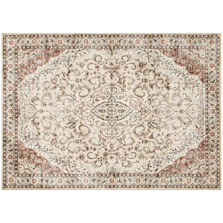 Rectangular cream area rug with ornate floral center medallion and brown border