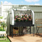 Raised garden bed with greenhouse cover and front windows, black frame with lower shelf